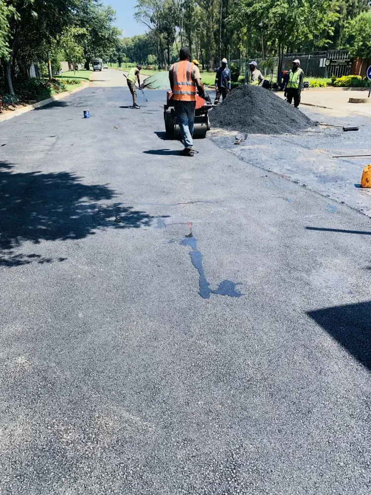 Driveway, parking and road surfaces of the kind we tar in Benoni