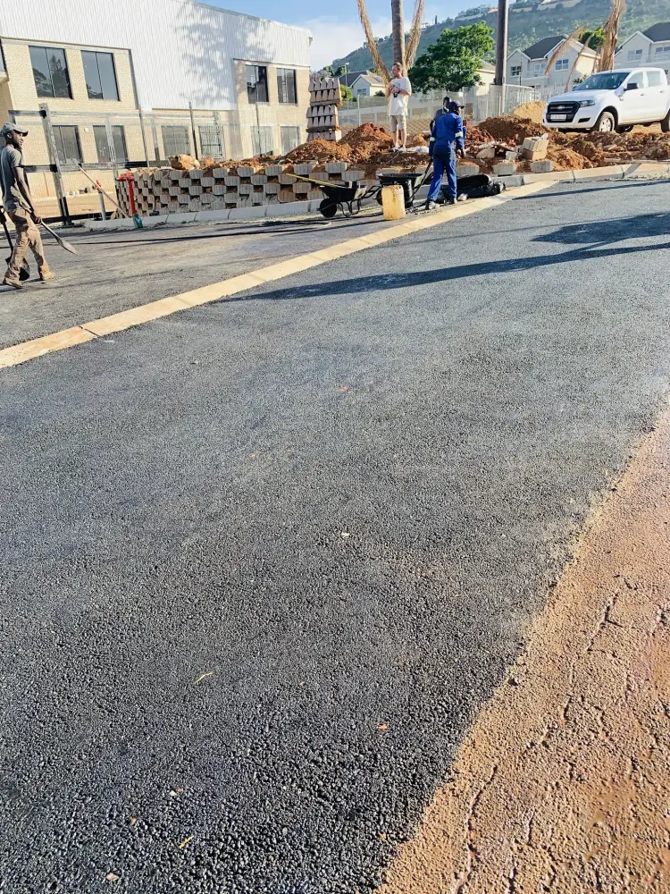 Compacted base layers being prepared before surfacing